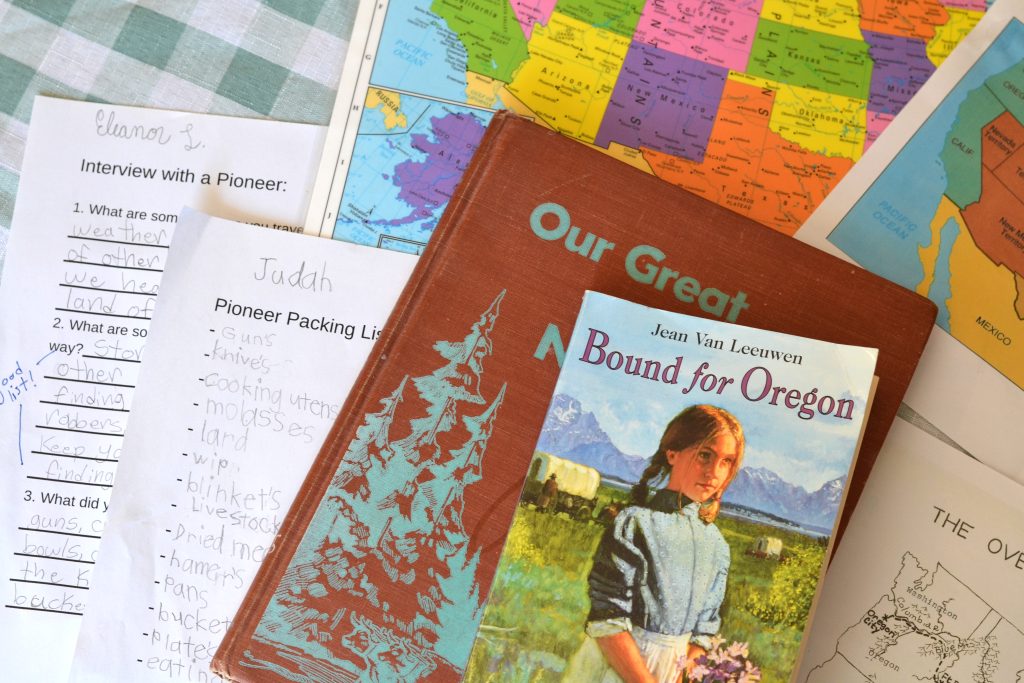 materials for Oregon Trail unit study, including Bound for Oregon and maps of the US